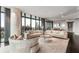 Elegant living room showcasing expansive windows, sleek finishes and modern furnishings at 750 Park Ne Ave # 19E, Atlanta, GA 30326