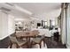 Open concept living room and dining area with hardwood floors and modern decor, offering a great space at 750 Park Ne Ave # 19E, Atlanta, GA 30326