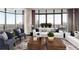 Bright living room with floor to ceiling windows, hardwood floors, and two white sofas with decorative pillows at 750 Park Ne Ave # 19E, Atlanta, GA 30326