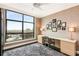 Bright office area with a large window view and sleek desk at 750 Park Ne Ave # 19E, Atlanta, GA 30326