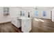 Stylish kitchen with a white center island and stainless steel faucet, creating a modern focal point at 1098 Wedgewood Nw Dr, Atlanta, GA 30318