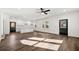 Bright living room features sleek hardwood floors, modern lighting, and an open-concept design at 1098 Wedgewood Nw Dr, Atlanta, GA 30318