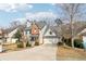 Attractive two-story home with a brick facade and a well-maintained lawn and driveway at 1902 Elm Park Dr, Hampton, GA 30228