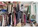 Organized walk-in closet features shelving and hanging rods for ample storage at 1902 Elm Park Dr, Hampton, GA 30228