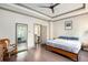 Spacious bedroom with hardwood floors, ceiling fan and bright, natural light at 589 Broadview Ne Pl, Atlanta, GA 30324