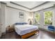 Bright bedroom with hardwood floors, tray ceilings and beautiful windows at 589 Broadview Ne Pl, Atlanta, GA 30324