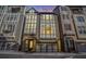 Beautiful townhome with brick and tudor detailing, and an attached garage at 589 Broadview Ne Pl, Atlanta, GA 30324