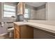 Bathroom featuring a vanity, white countertop, accessible bars, and neutral tones at 2446 Sunset Ne Dr, Atlanta, GA 30345