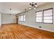 Spacious living room with hardwood flooring and natural light from large windows at 2446 Sunset Ne Dr, Atlanta, GA 30345