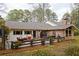 Backyard with patio and exterior view of the home featuring a brick facade at 2574 Sugarplum Ne Ct, Atlanta, GA 30345