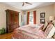 Serene bedroom with hardwood floors, ensuite bathroom and a large wardrobe at 2574 Sugarplum Ne Ct, Atlanta, GA 30345