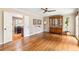 Open-concept view of a living room with hardwood floors and direct access to the kitchen at 2574 Sugarplum Ne Ct, Atlanta, GA 30345