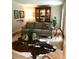 Inviting living room with a neutral sofa, glass coffee table, and unique decor with a jute rug at 2574 Sugarplum Ne Ct, Atlanta, GA 30345