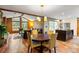 Open-concept living area with a dining area, living room with plenty of natural light and hardwood floors at 2574 Sugarplum Ne Ct, Atlanta, GA 30345