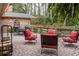 Inviting outdoor patio with comfortable seating, brick paving, and view of the landscaped backyard at 2574 Sugarplum Ne Ct, Atlanta, GA 30345