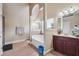 Bathroom featuring a bathtub and shower, tile flooring, and a double sink at 4205 Idlewood Dr, Cumming, GA 30040