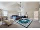 Bright bedroom with a decorative rug, neutral walls, and vaulted ceilings at 4205 Idlewood Dr, Cumming, GA 30040
