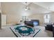 Bedroom with neutral carpeting, vaulted ceilings, and a large area rug at 4205 Idlewood Dr, Cumming, GA 30040