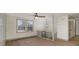 Bright open-concept living space featuring modern finishes and wood-look flooring at 6645 Doublegate Ln, Rex, GA 30273