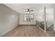 Spacious living area showcasing modern finishes, lots of natural light, and stairs at 6645 Doublegate Ln, Rex, GA 30273