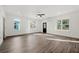 Bright and airy open-concept living room features hardwood floors, recessed lights and great outdoor views at 1092 Wedgewood Nw Dr, Atlanta, GA 30318