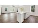 Open-concept space includes a modern kitchen island and contemporary finishes that blend style with function at 1092 Wedgewood Nw Dr, Atlanta, GA 30318