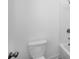 Clean, bright bathroom featuring a shower over bath and modern fixtures at 1466 Auburn Glen Rd, Dacula, GA 30019