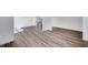 Open-concept living area with hardwood floors, large windows, and ample natural light at 1466 Auburn Glen Rd, Dacula, GA 30019