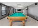Basement game room featuring a pool table and tv area at 3321 Spindletop Nw Dr, Kennesaw, GA 30144