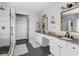 Bright bathroom featuring a glass shower, and double vanity with granite countertops at 3321 Spindletop Nw Dr, Kennesaw, GA 30144