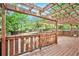 Expansive wood deck with an overhead pergola, overlooking the fenced backyard at 2533 Semmes St, East Point, GA 30344