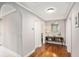 Welcoming hallway with hardwood floors and archway entry at 2533 Semmes St, East Point, GA 30344