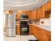 Classic kitchen with stainless steel refrigerator and plenty of cabinet storage at 2533 Semmes St, East Point, GA 30344