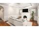 Cozy living room with hardwood floors, fireplace, and recessed lighting at 2533 Semmes St, East Point, GA 30344