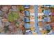 Aerial view showcases tree-lined neighborhood streets with mature landscaping and well-kept homes at 1050 Westwell Run, Alpharetta, GA 30022