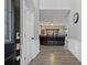Bright foyer with wood floors leading to a spacious living area at 1050 Westwell Run, Alpharetta, GA 30022