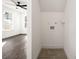 Bright laundry room features tile floors and convenient hookups, adding functionality to the home at 1088 Wedgewood Nw Dr, Atlanta, GA 30318