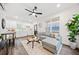 Bright and airy living room with a comfortable sofa and access to modern kitchen at 1088 Wedgewood Nw Dr, Atlanta, GA 30318
