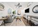 Cozy living room featuring a comfortable sofa, stylish decor, and bright natural light at 1088 Wedgewood Nw Dr, Atlanta, GA 30318