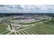 Overhead view of a racetrack facility featuring grandstands, track layout and surrounding landscape at 11661 Mendenhall Ct, Hampton, GA 30228