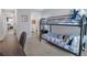 Cozy bedroom featuring a bunk bed, desk, and soft carpeting, perfect for  at 11661 Mendenhall Ct, Hampton, GA 30228