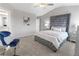 A main bedroom features a tufted headboard bed with carpet and a sitting area at 11661 Mendenhall Ct, Hampton, GA 30228