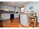 Charming kitchen with painted cabinets, butcher block countertops, and stainless appliances at 15 Russell Ln, Carrollton, GA 30116