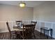 Traditional dining room with hardwood floors and a dining table with seating for four at 501 Carlton Rd # 3F, Palmetto, GA 30268