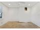 Unfinished basement area with concrete floors and open ceilings offering potential for customization at 70 Wentworth Ln, Villa Rica, GA 30180