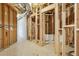 Unfinished basement showing exposed framing and insulation, ready for customization at 70 Wentworth Ln, Villa Rica, GA 30180