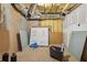 Unfinished basement with utilities and construction materials awaiting project completion at 70 Wentworth Ln, Villa Rica, GA 30180