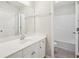 Bathroom with a large mirror, sink, and shower/tub combo at 70 Wentworth Ln, Villa Rica, GA 30180
