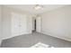 Bedroom features neutral walls, carpet, a ceiling fan, and a closet at 70 Wentworth Ln, Villa Rica, GA 30180