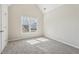 Bedroom with a window, neutral walls, carpet, and lots of natural light at 70 Wentworth Ln, Villa Rica, GA 30180